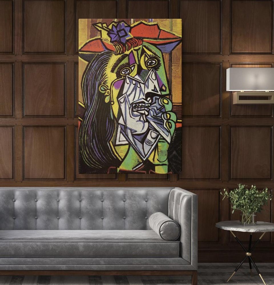 elegant-living-room-with-grey-velvet-sofa-and-wood-panel-wall-featuring-picasso-cubist-art-painting-print-weeping-woman Elegant living room with grey velvet sofa and wood panel wall, featuring Picasso’s Cubist Art painting print “Weeping Woman.”