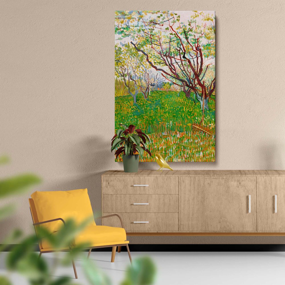 Vincent van Gogh's The Flowering Orchard (1888) showcases a vivid spring scene with colorful blossoms, lush green grass, and bold brushstrokes, capturing the beauty of nature's awakening in a post-impressionist wall art masterpiece.