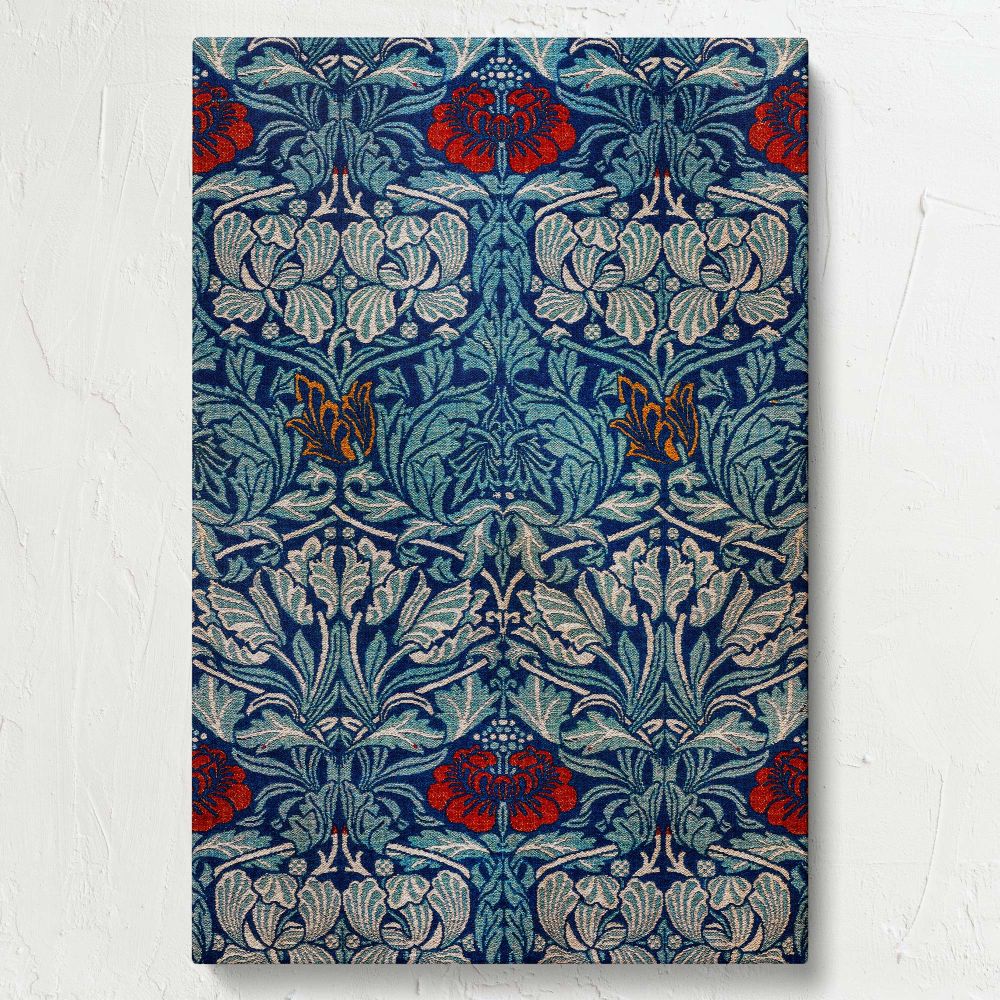 Historical William Morris Tulip and Rose design showcasing intricate botanical patterns with red and gold flowers set against a dark blue background, reflecting classic Art Nouveau textile art for timeless home decor enthusiasts.