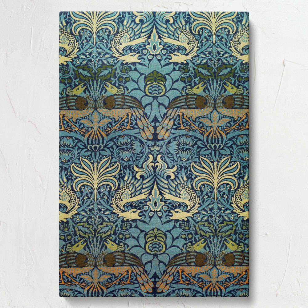 William Morris Peacock and Dragon textile artwork featuring symmetrical mythical dragon and peacock designs with intertwining green foliage and golden details on a deep blue background, perfect for historical home decor or vintage upholstery projects.
