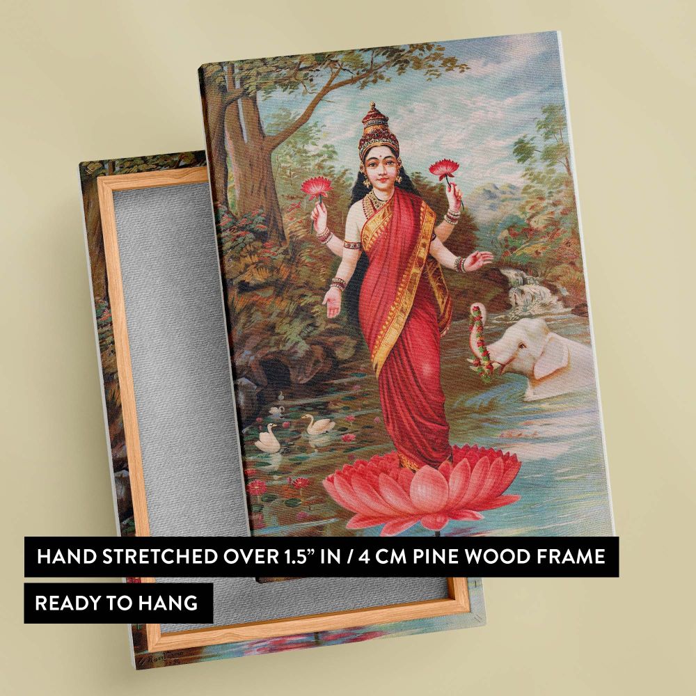 Artistic representation of Goddess Lakshmi from 1894, featuring her standing on a lotus flower, wearing a red saree with gold detailing, holding lotus flowers, with an elephant offering a garland and swans swimming in a tranquil river.