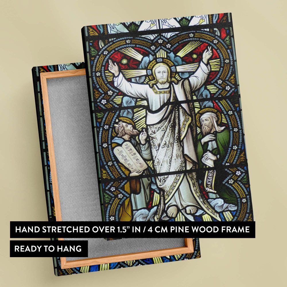Vibrant stained glass window depicting Christ with arms raised in blessing, accompanied by Moses with the Ten Commandments and Elijah with a prophetic scroll, surrounded by intricate Gothic patterns and vibrant colors reflecting divine light.