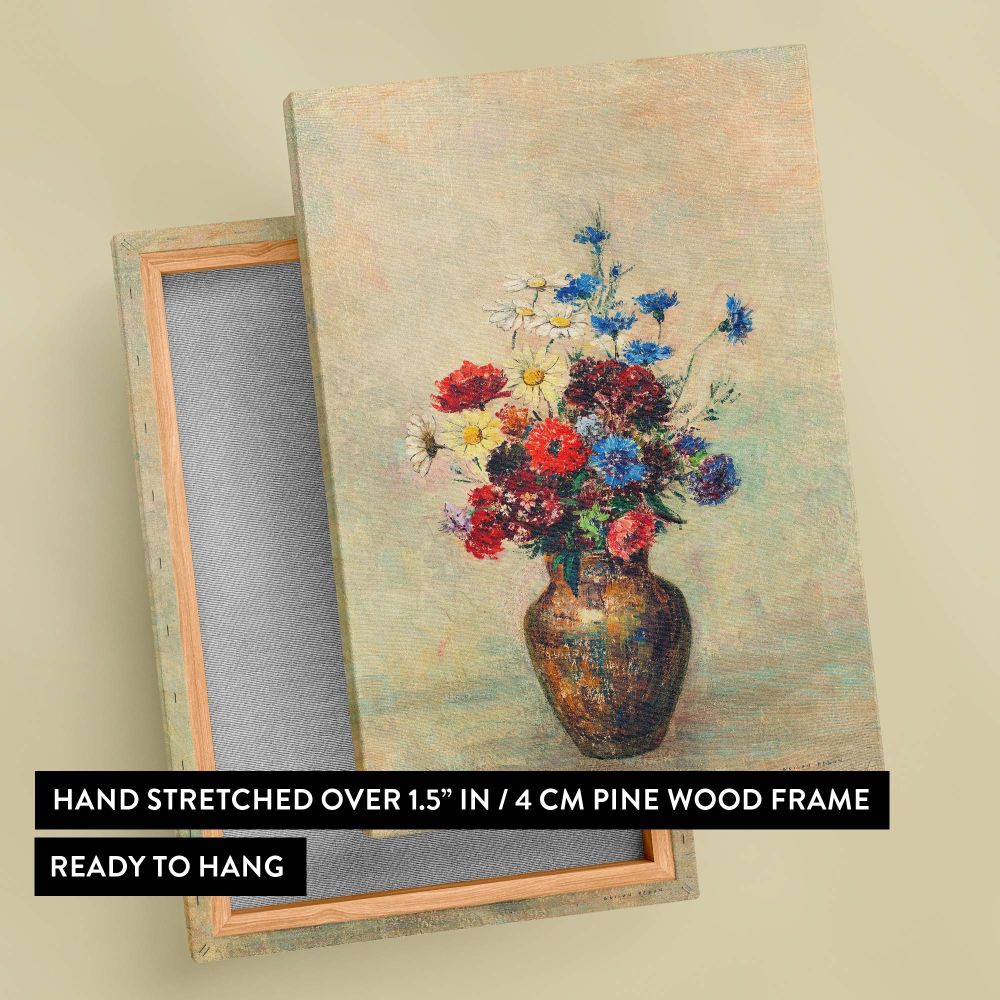 Still life floral wall canvas of Flowers in a Vase by Odilon Redon featuring red, blue, yellow, and white blooms in a golden rustic vase on a textured background, offering a timeless and nature-inspired addition to home or office interiors.