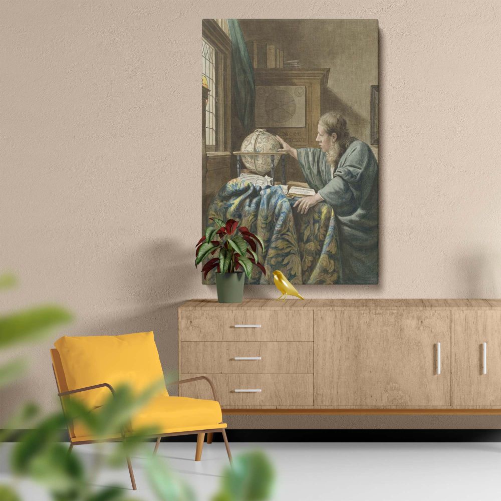 Classic reproduction of De Astronoom by Abraham Delfos and Johannes Vermeer showing a scholar studying a globe in a softly lit room, with intricate details in the draped tablecloth, books, and celestial chart creating a sophisticated atmosphere.