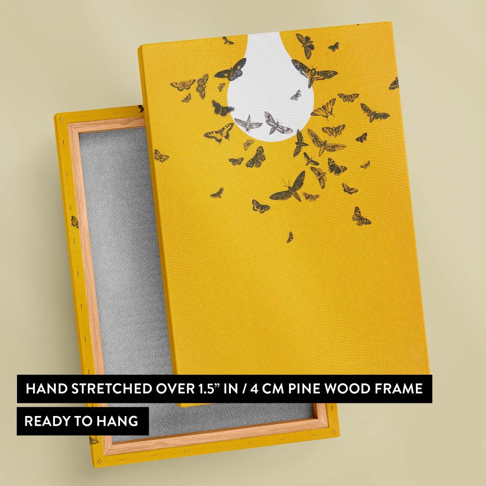 Unique and artistic yellow wall canvas art featuring moths flying around a glowing lightbulb in striking black and white contrast, making it a perfect addition to modern, minimalist, or eclectic home decor themes.