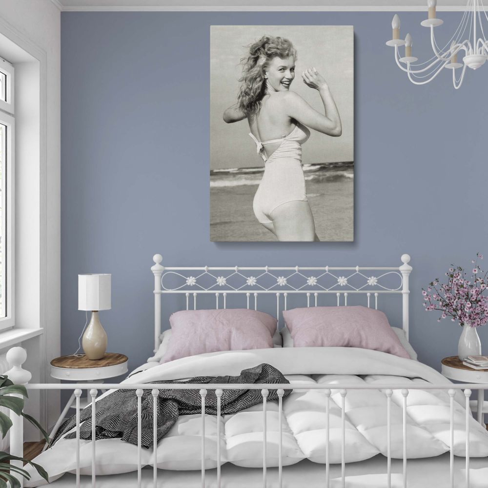 Elegant Marilyn Monroe canvas print with black and white tones featuring her in a bikini on the beech ideal nude art for modern home decor.