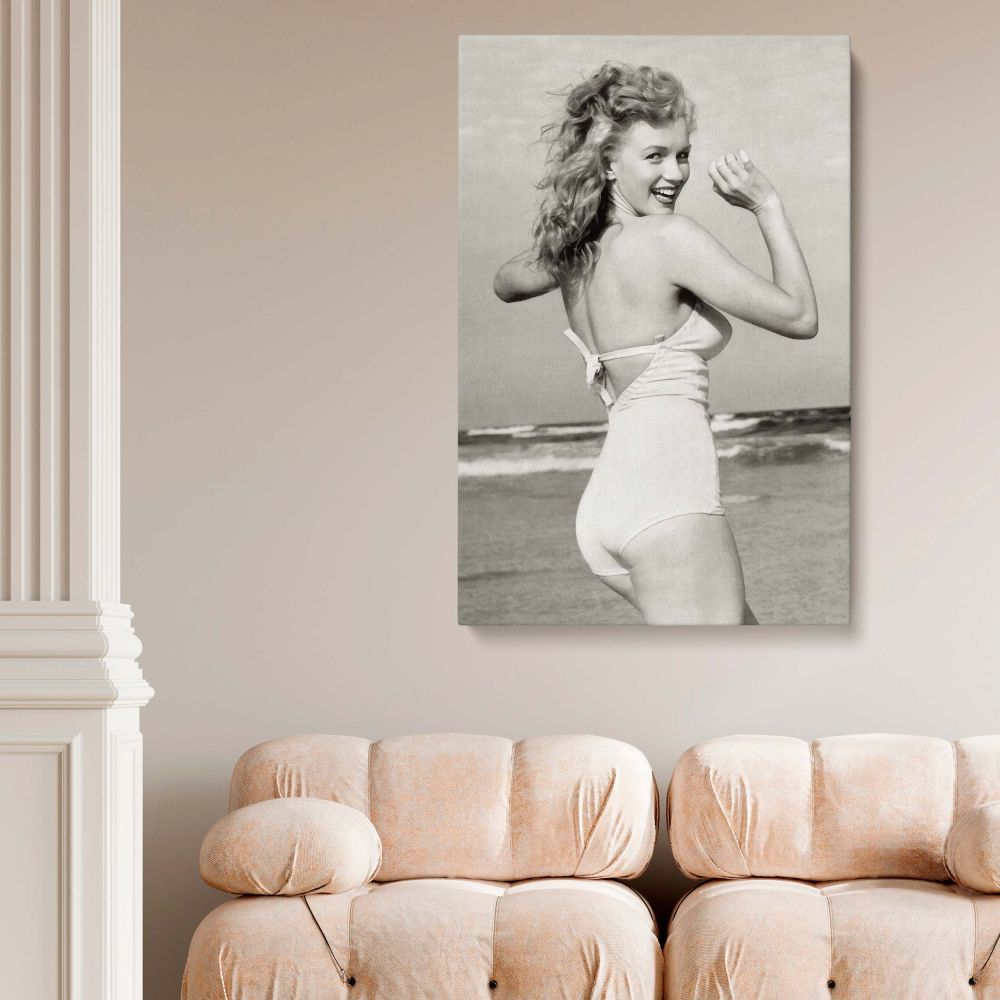 Black and white canvas of Marilyn Monroe turning with a smile in beach bikini a bold trendy wall art piece for bedroom or living room decor.