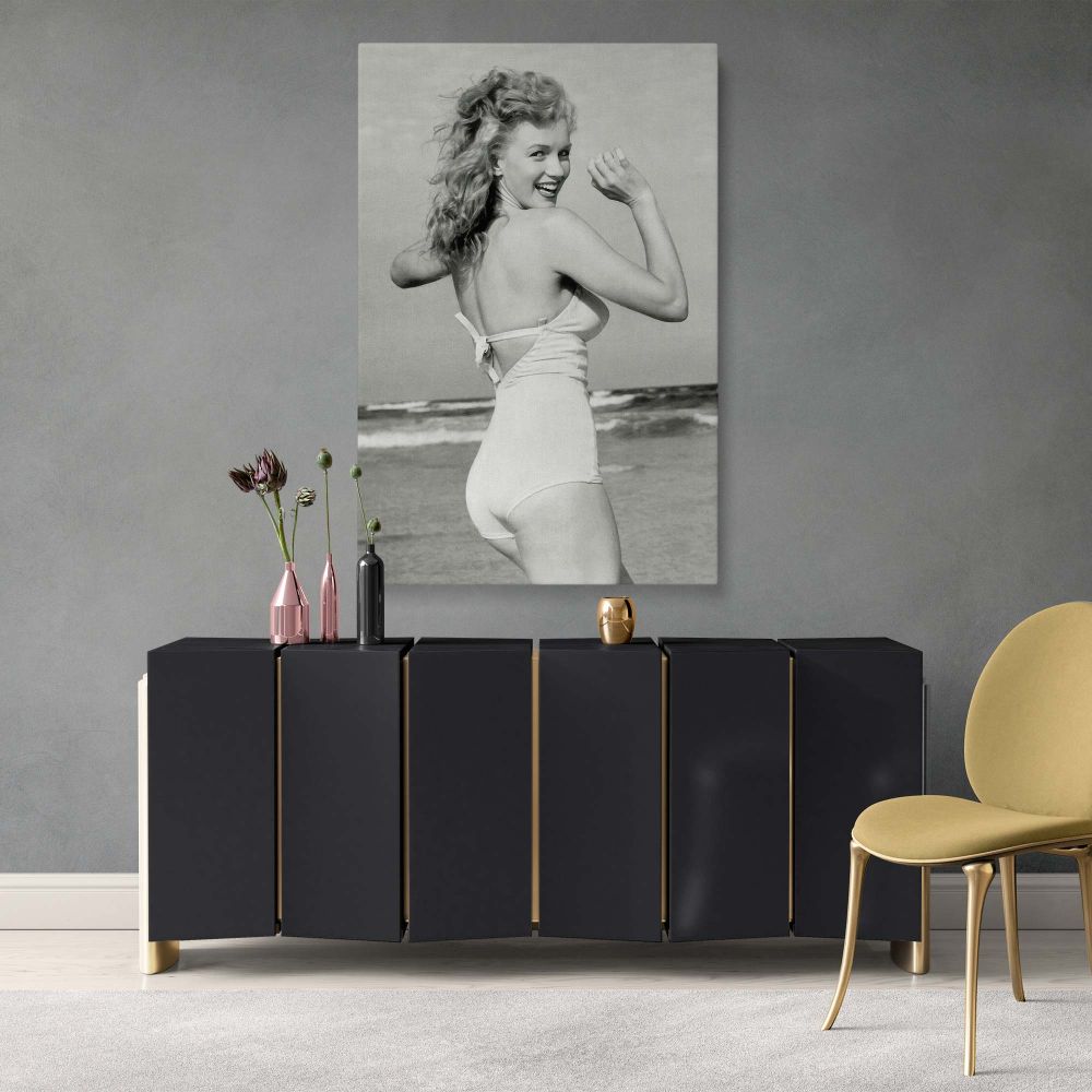 Home decor canvas print of Marilyn Monroe posing playfully in bikini at the beech ideal for lovers of nude art and iconic canvas wall art.