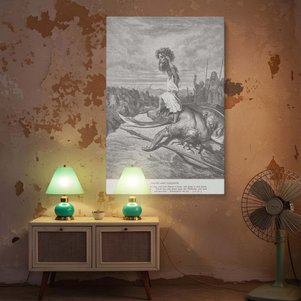 This black and white wall canvas features Gustave Dore's iconic engraving of David's victory over Goliath. David lifts Goliath's head triumphantly while his foot rests on the slain giant. Behind him, armies and leaders react with awe. The image delivers d