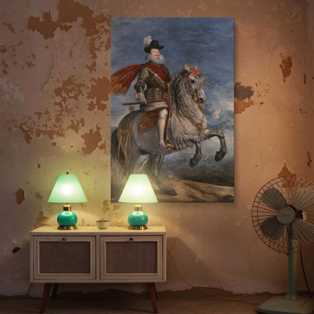 A classic canvas wall art reproduction of Velazquez's equestrian portrait of Philip III captures the Spanish king in ceremonial armor riding a spirited white horse, creating a bold visual centerpiece rooted in royal history and baroque expression.