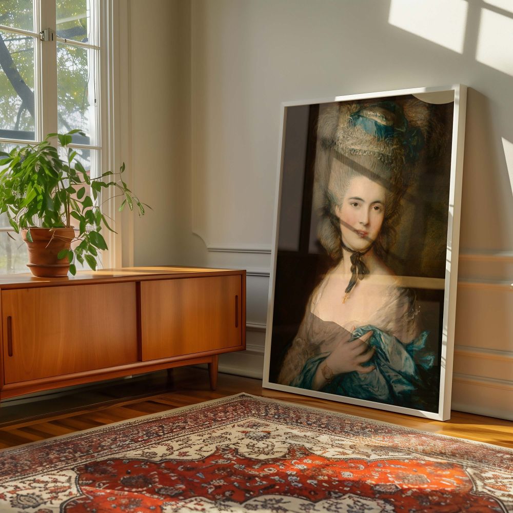 A sophisticated canvas wall print of Gainsborough's 18th-century painting, depicting a noblewoman in pale blue attire with rich lace and a stylish choker. Her expression is dignified yet soft, surrounded by subdued tones that emphasize her ethereal presen