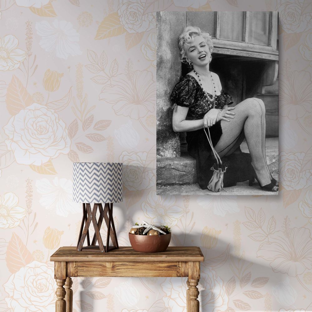 Marilyn Monroe canvas wall art featuring her 1956 photo by Milton Greene showing her in fishnet tights with a classic vintage look perfect for bedroom wall decor and trendy home decor
