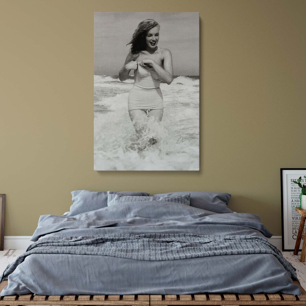 Stylish Marilyn Monroe wall art featuring a black and white framed canvas print of the Hollywood icon. A perfect addition to any home or office, this vintage-inspired artwork captures Marilyn's timeless beauty. A great gift for collectors, Monroe enthusia