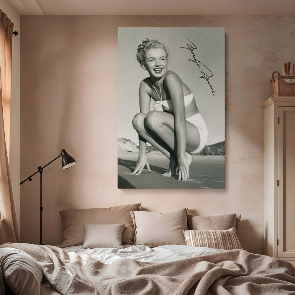 Elegant Marilyn Monroe wall art showcasing a black-and-white beach photo. This high-quality framed canvas print is perfect for bedroom, living room, or office decor. A must-have for Marilyn fans and lovers of vintage aesthetics.