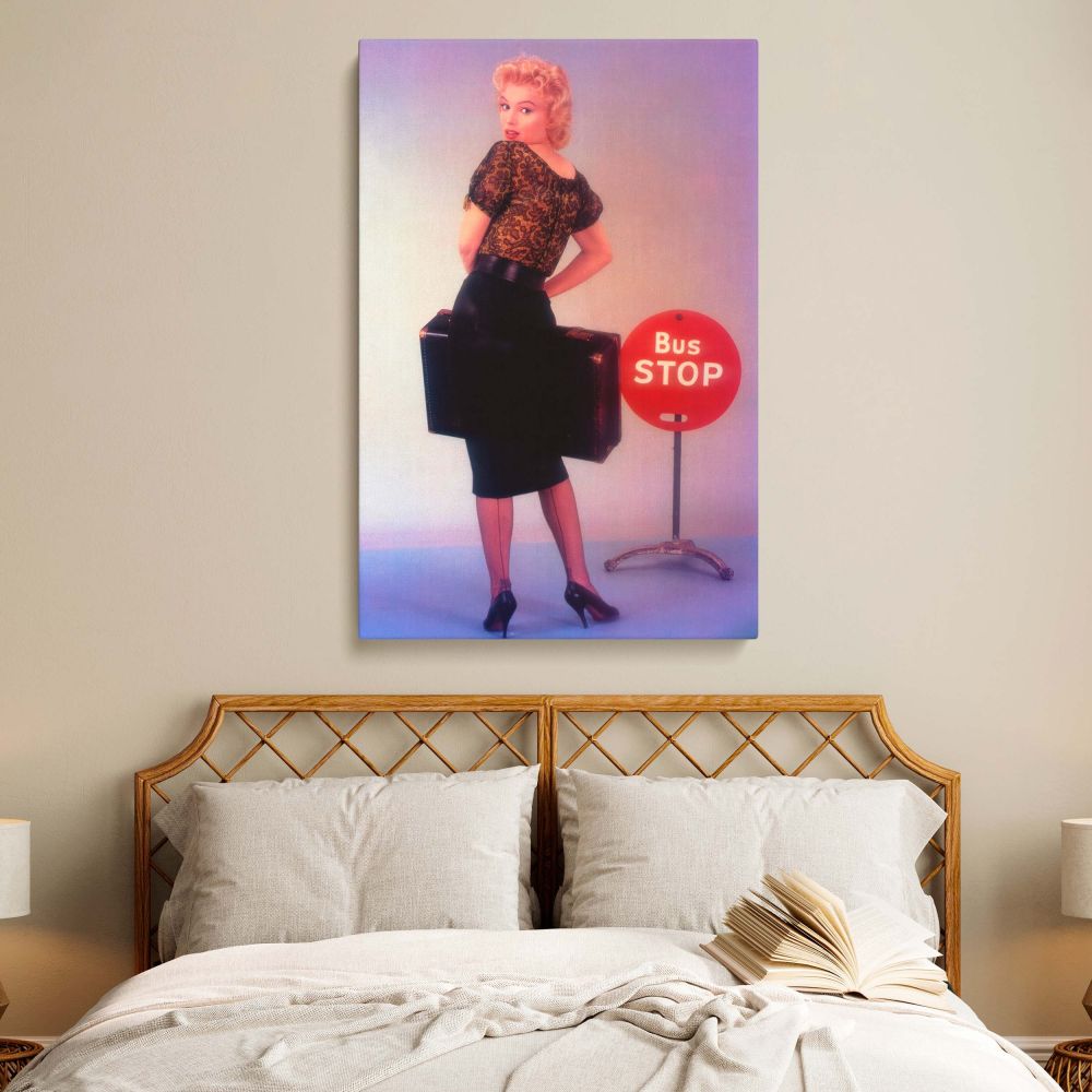 Marilyn Monroe wearing a black lace blouse and pencil skirt in iconic Bus Stop image now as canvas wall art for classic film lovers