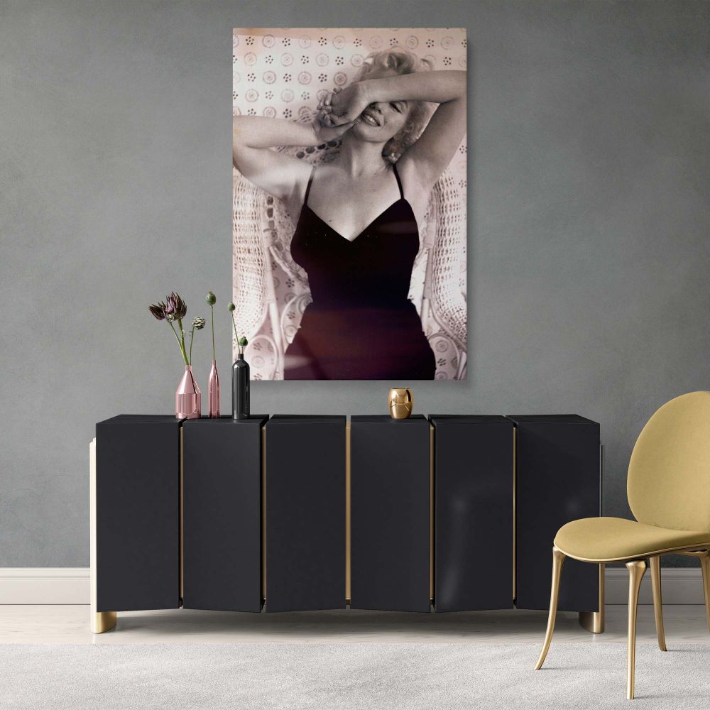Iconic Marilyn Monroe retro photo in a sultry pose, bringing classic glamour and vintage aesthetics to your wall decor.