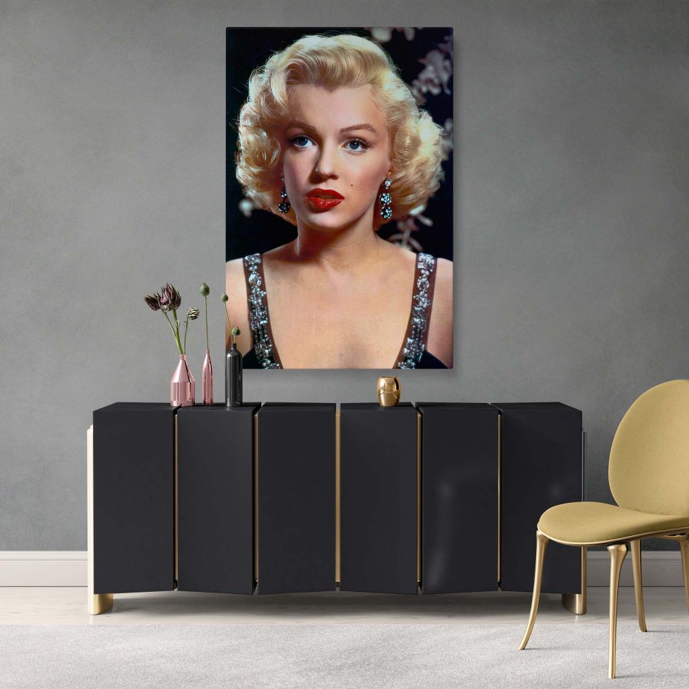 A glamorous close up portrait of Marilyn Monroe showcases her as the epitome of vintage Hollywood glamour. Her flawless makeup, curled hair, and sparkling earrings are beautifully captured in this high-resolution photo. Designed as a premium vintage Holly