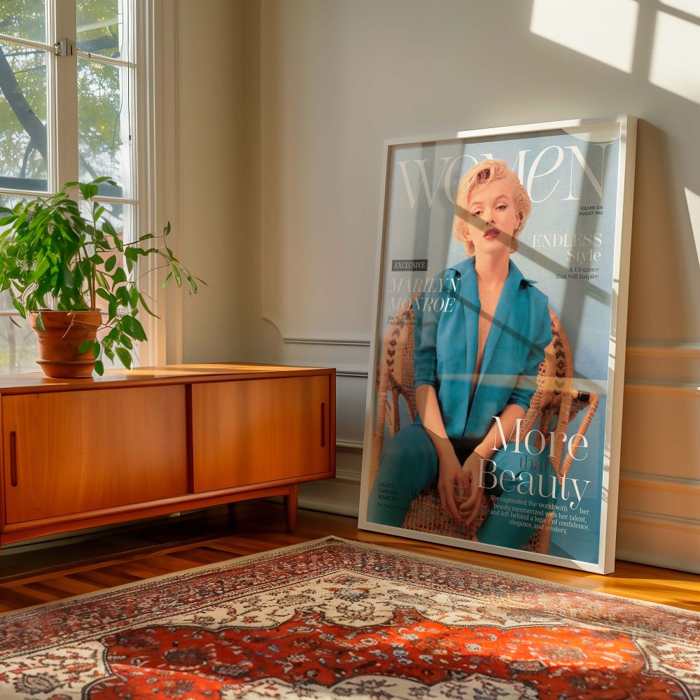 Stunning portrait of Marilyn Monroe turned into a fashion poster where she sits in a blue pantsuit styled like a retro magazine cover ideal for adding vintage wall decor to personal spaces while celebrating the timeless influence of Hollywood glam and cin