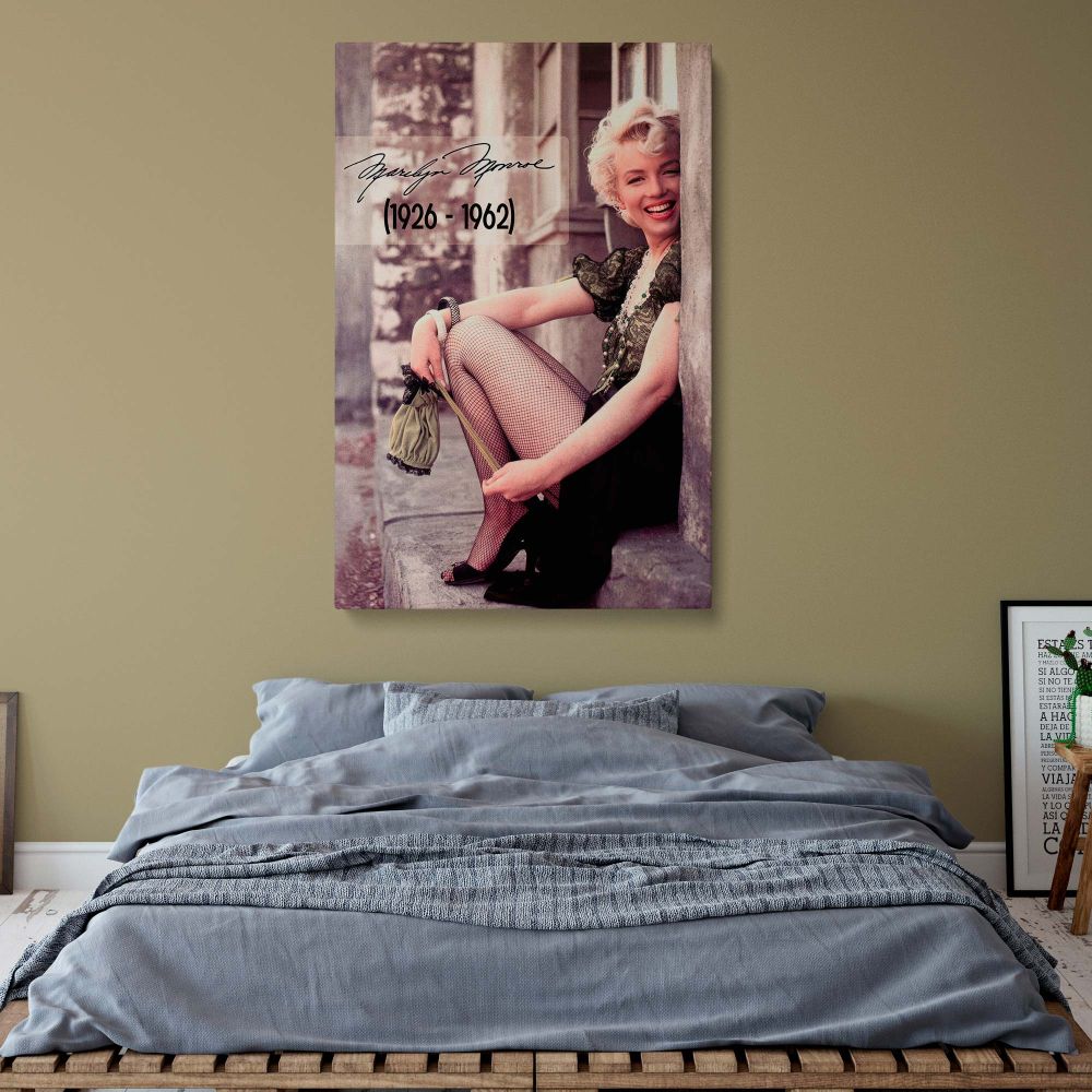 Vintage Marilyn Monroe canvas print showcasing her in fishnet stockings and a stylish lace puff sleeve blouse romantic and classic home decor.