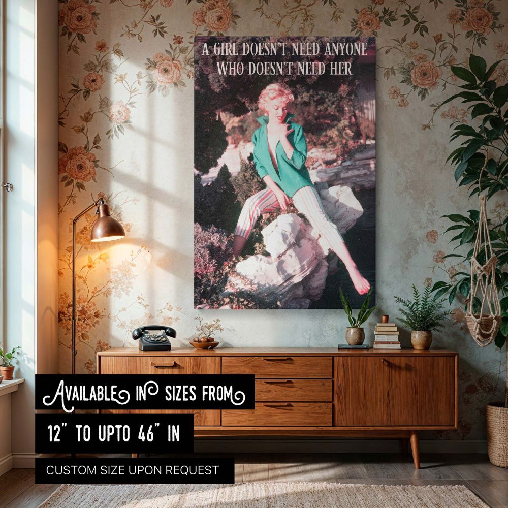 Marilyn Monroe seated outdoors on stone with lush garden background wearing striped pants and green blouse with quote a girl doesn't need anyone who doesn't need her making this vintage fashion wall art ideal for classic Hollywood and inspirational quote 