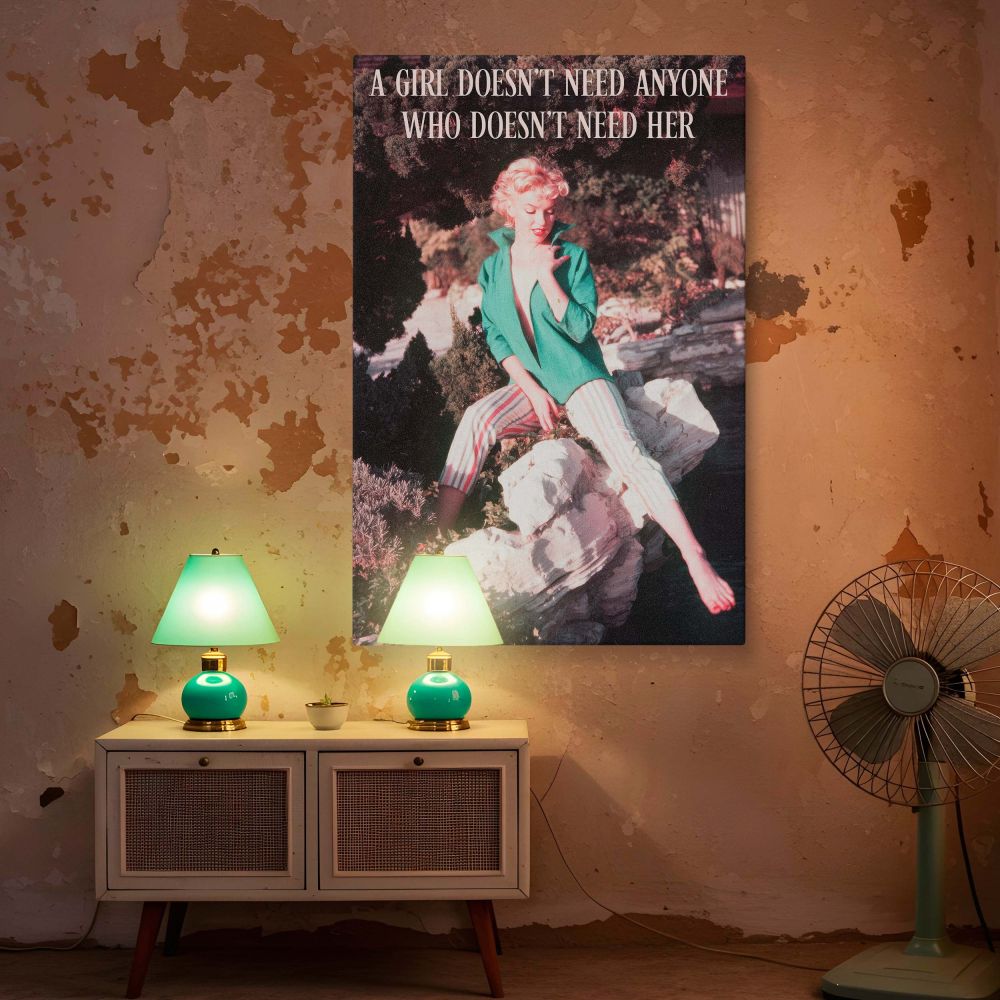 Feminine strength and classic glamour come together in this Marilyn Monroe art print where she lounges in striped pants and green top paired with inspirational quote text creating perfect vintage decor for home office or personal studio wall space.