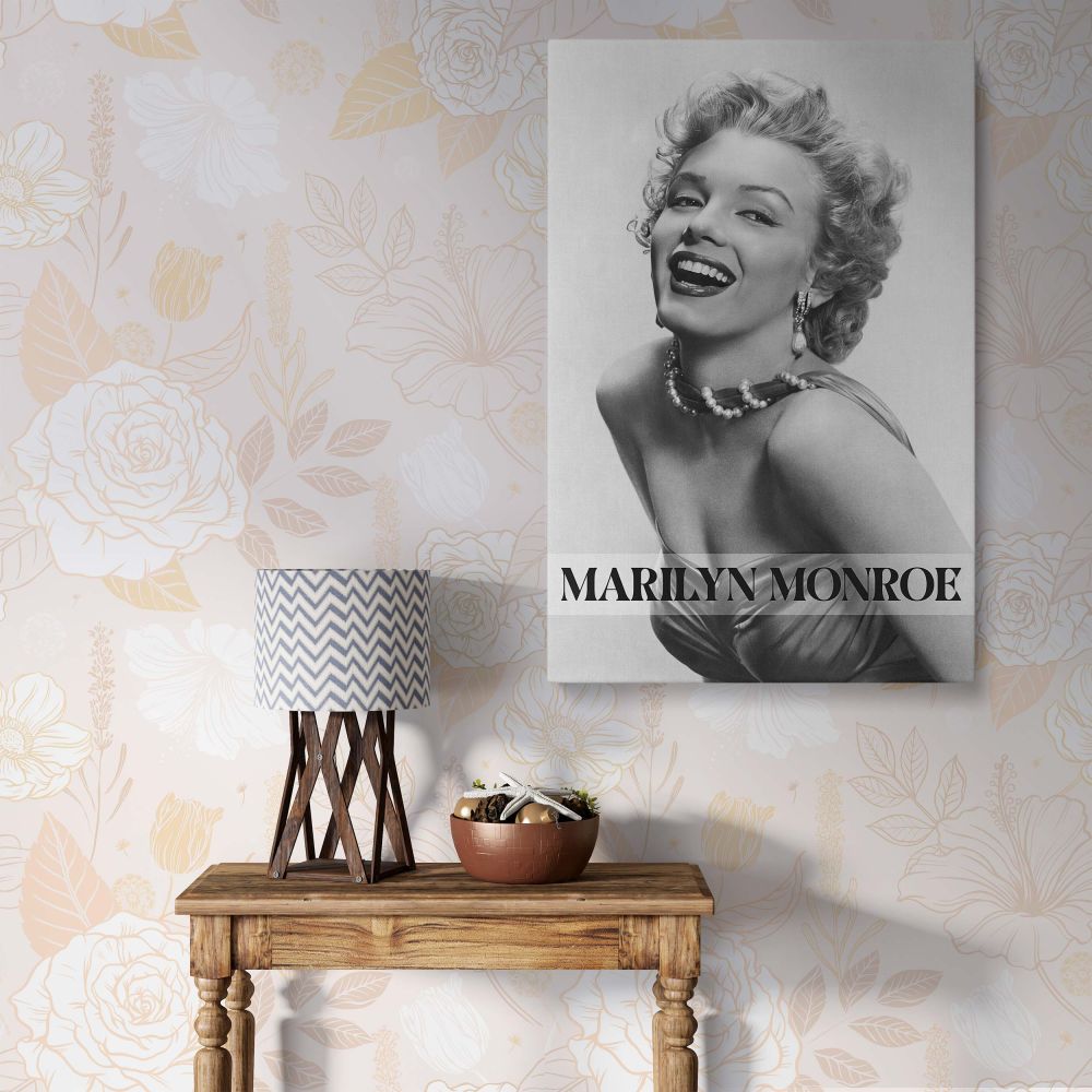 Marilyn Monroe smiling in pearl necklace and elegant gown captured in black and white vintage Hollywood photo perfect for classic actress print collectors and retro wall art displays in glamorous interiors.