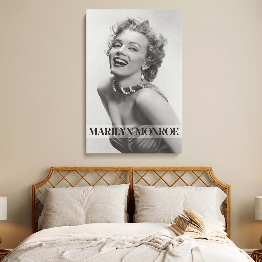 Vintage photo of Marilyn Monroe smiling brightly with pearl necklace and soft curls printed on canvas perfect for retro wall art and black and white portrait collectors.