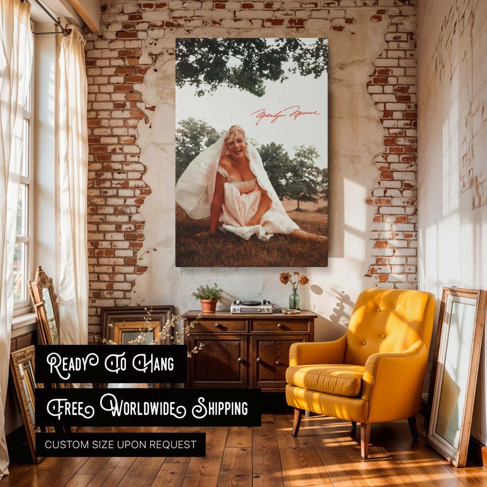 This artwork shows Marilyn Monroe in a white lace dress seated on the lawn captured in a candid joyful pose making it an elegant wall piece for vintage decor collectors old Hollywood enthusiasts and anyone seeking graceful classic celebrity imagery.