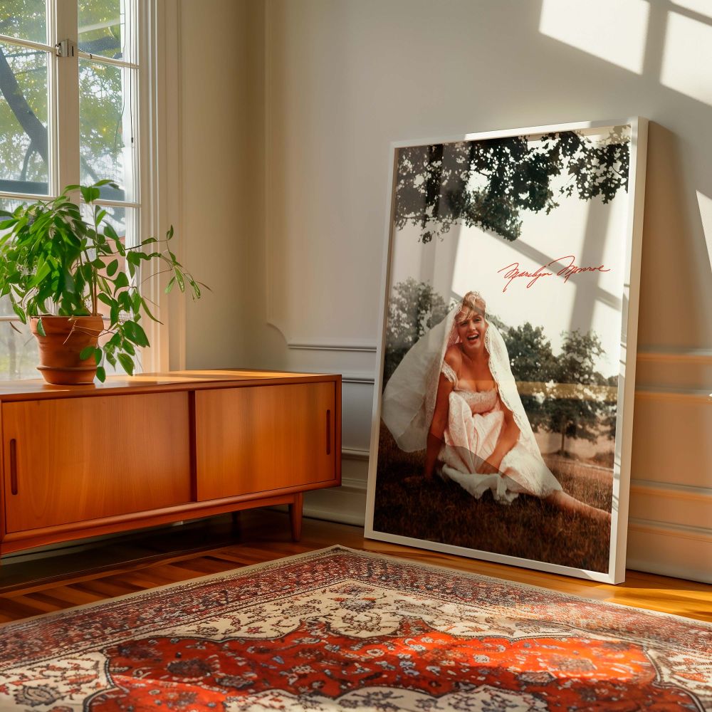 Marilyn Monroe outdoors in elegant white dress radiant and joyful in this photograph perfect for vintage celebrity art retro charm decor or classic feminine gallery walls where timeless beauty and Hollywood elegance are key.