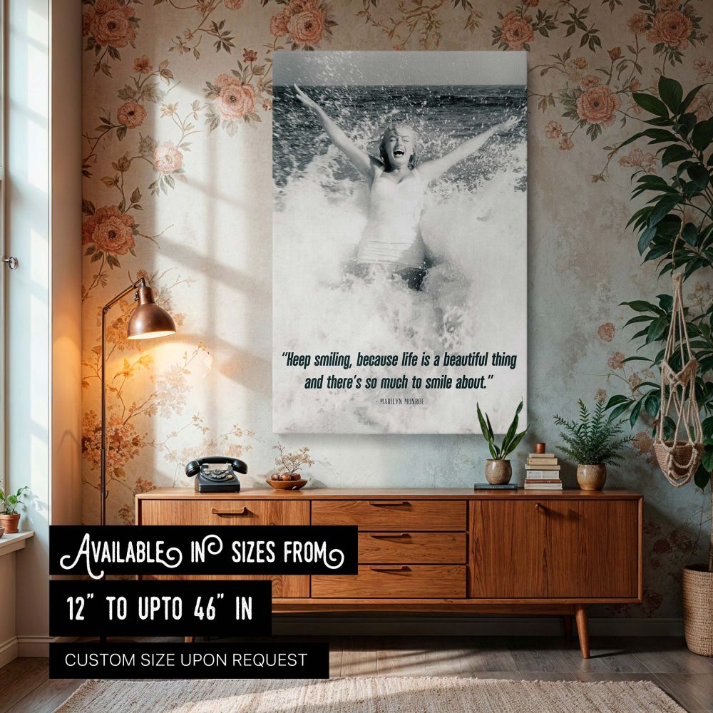 Black and white photo of Marilyn Monroe laughing in ocean waves with her arms raised high and her quote Keep smiling because life is a beautiful thing and there's so much to smile about printed below ideal for inspirational quote prints vintage beach phot