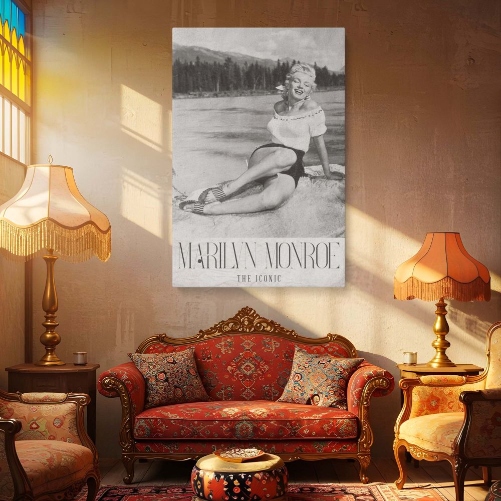 Elegant vintage wall art featuring Marilyn Monroe in a lakeside setting seated in a relaxed pose with radiant charm and a breezy 1950s outfit designed for classic film lovers looking to add Hollywood nostalgia to their living space with Monroe's charisma 