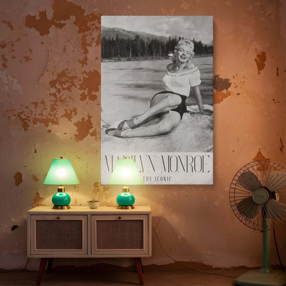Beautifully detailed black and white photo art of Marilyn Monroe in nature dressed in casual yet glamorous 1950s fashion leaning on a rock with an unforgettable smile great for vintage room styling or collectors of celebrity photo prints.