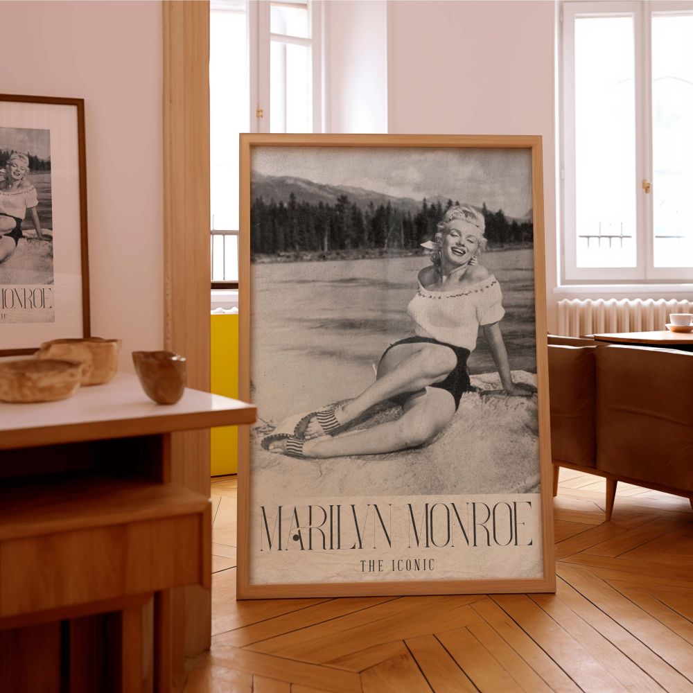 Iconic photograph of Marilyn Monroe styled in a simple lakeside outfit radiating effortless beauty and classic Hollywood personality in a peaceful natural scene perfect for retro wall decor enthusiasts who appreciate old movie legends and mid-century char