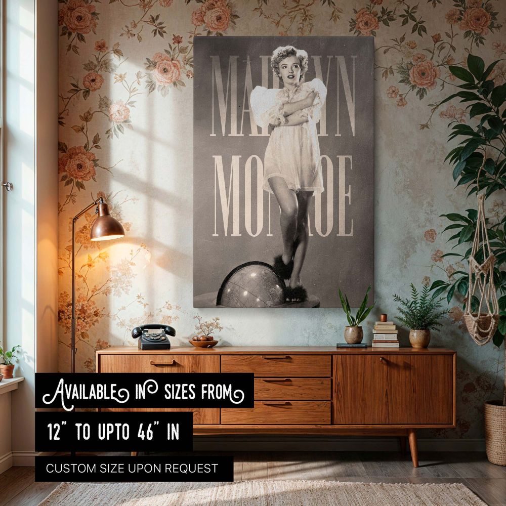 Vintage Marilyn Monroe wall art featuring her standing with one foot on a globe while wearing a sheer white dress this glamorous black and white photo captures classic Hollywood style and timeless elegance perfect for collectors of retro celebrity photogr