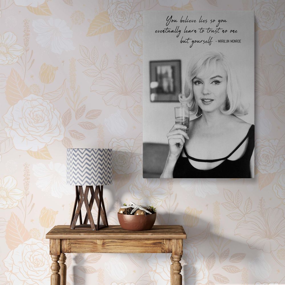 Marilyn Monroe quote poster featuring her in a black and white portrait holding a glass with elegant curls and calm expression paired with her empowering message perfect for vintage Hollywood print and retro actress decor in inspiring minimalist interiors