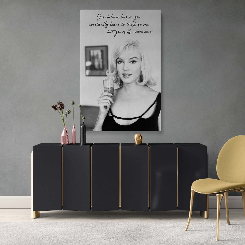 Marilyn Monroe seen in a calm and confident pose holding a glass with her handwritten quote above in this inspiring wall art poster great for retro actress decor and vintage Hollywood print styling for modern or classic spaces.