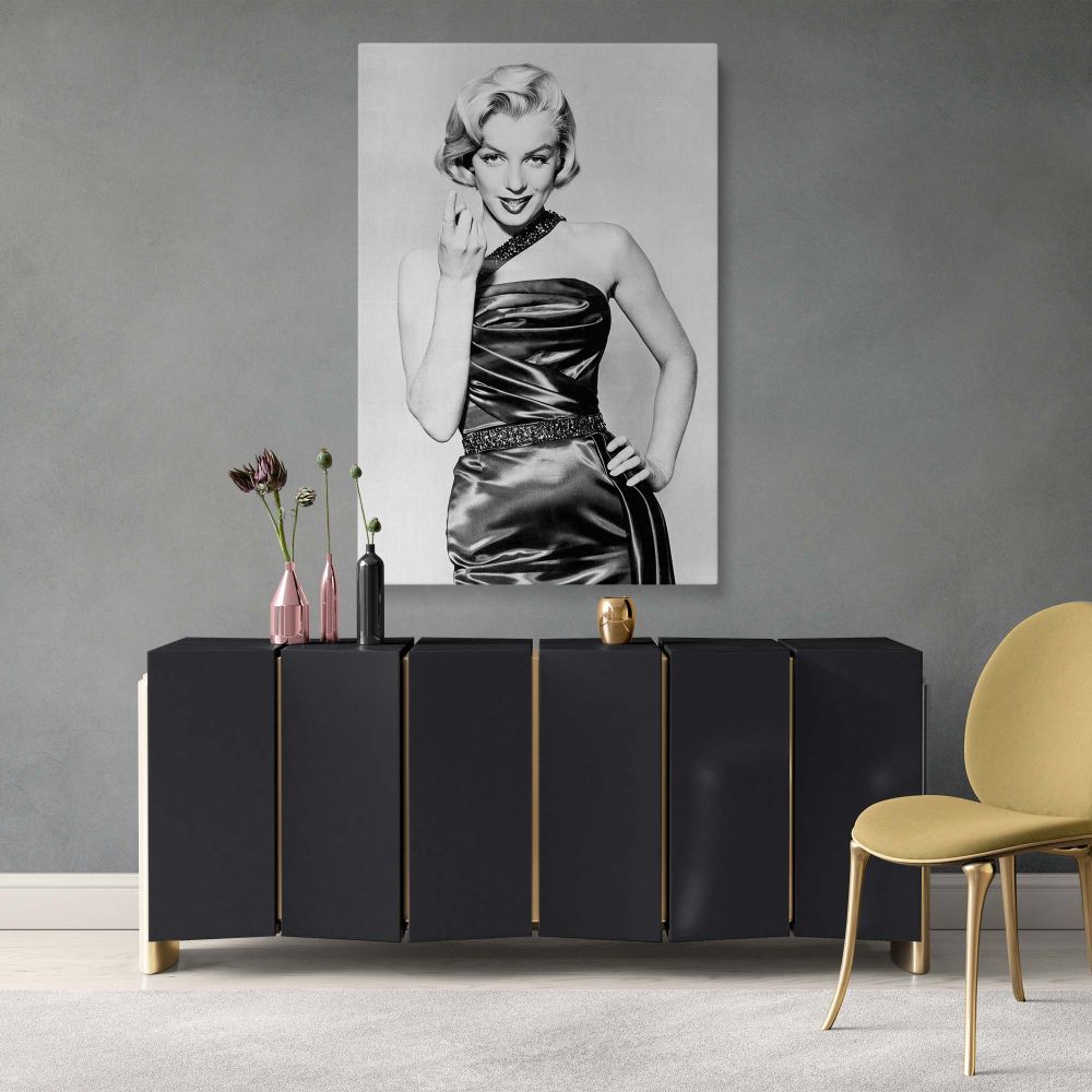Marilyn Monroe's iconic pose in satin dress captured in high-detail black and white for elegant vintage Hollywood canvas print ideal for retro actress wall art and fans of strong, stylish classic fashion photo artwork.