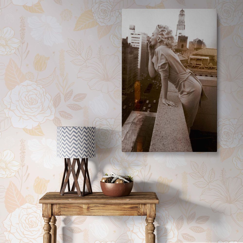 Marilyn Monroe blowing kiss on city rooftop in vintage black and white photo perfect for canvas and confident woman wall decor.