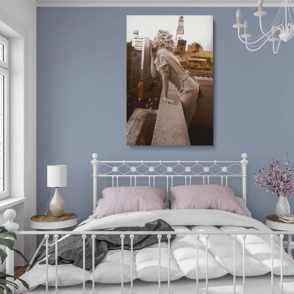 Retro Marilyn Monroe portrait in black and white showing feminine charm and bold pose great for wall decor.
