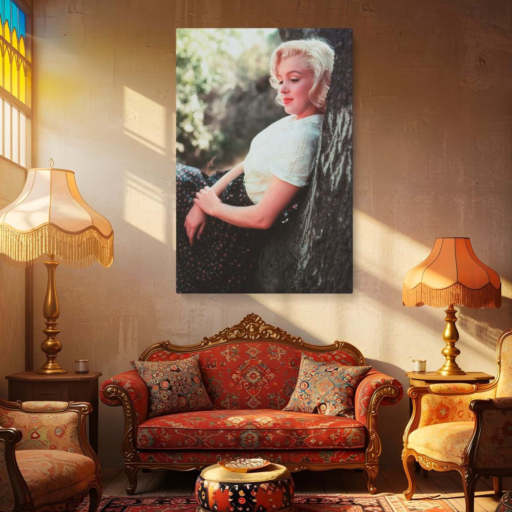 A soft and graceful image of Marilyn Monroe in an outdoor setting leaning peacefully on a tree wearing vintage 1950s clothing this classic film photo is transformed into a high-quality canvas print that celebrates her timeless beauty and adds nostalgic ch