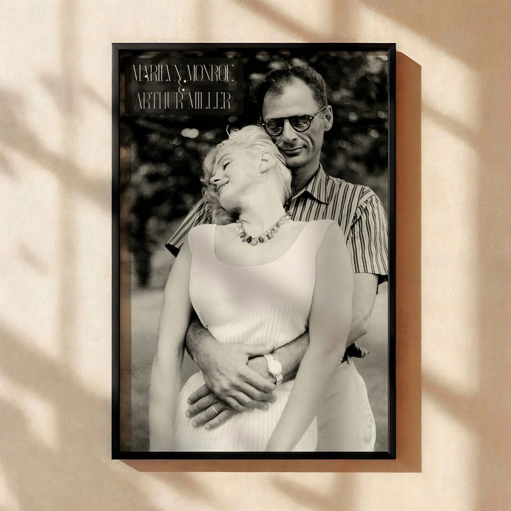 Iconic photo print of Marilyn Monroe and Arthur Miller standing together in a relaxed pose her smiling against his chest symbolizing vintage love and perfect for gallery walls showcasing classic celebrity romance black and white wall art and old Hollywood