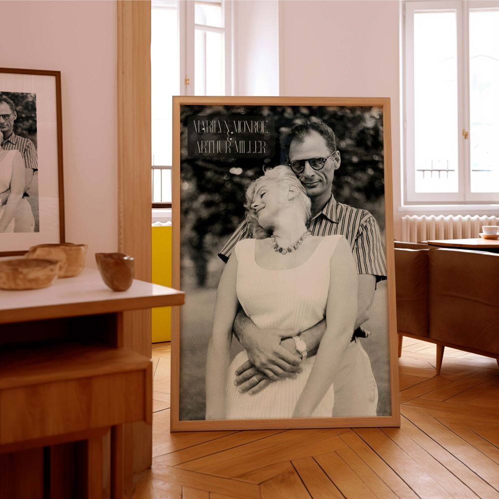 This black and white portrait of Marilyn Monroe and Arthur Miller captures authentic love and emotion making it a timeless addition to mid-century style rooms or retro celebrity galleries filled with romantic vintage moments.