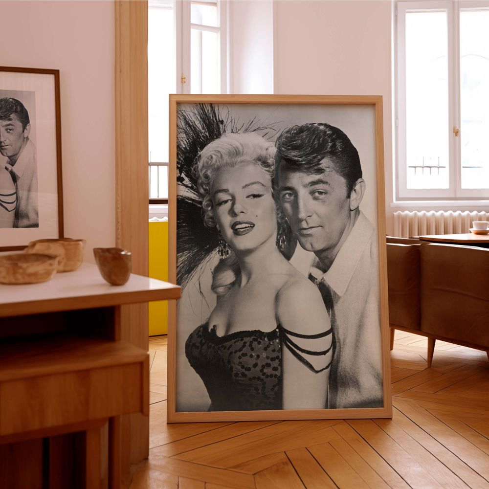 Black and white celebrity photo canvas featuring Marilyn Monroe and Robert Mitchum from River of No Return ideal for stylish home decor inspired by film history and classic Hollywood icons in elegant poses.