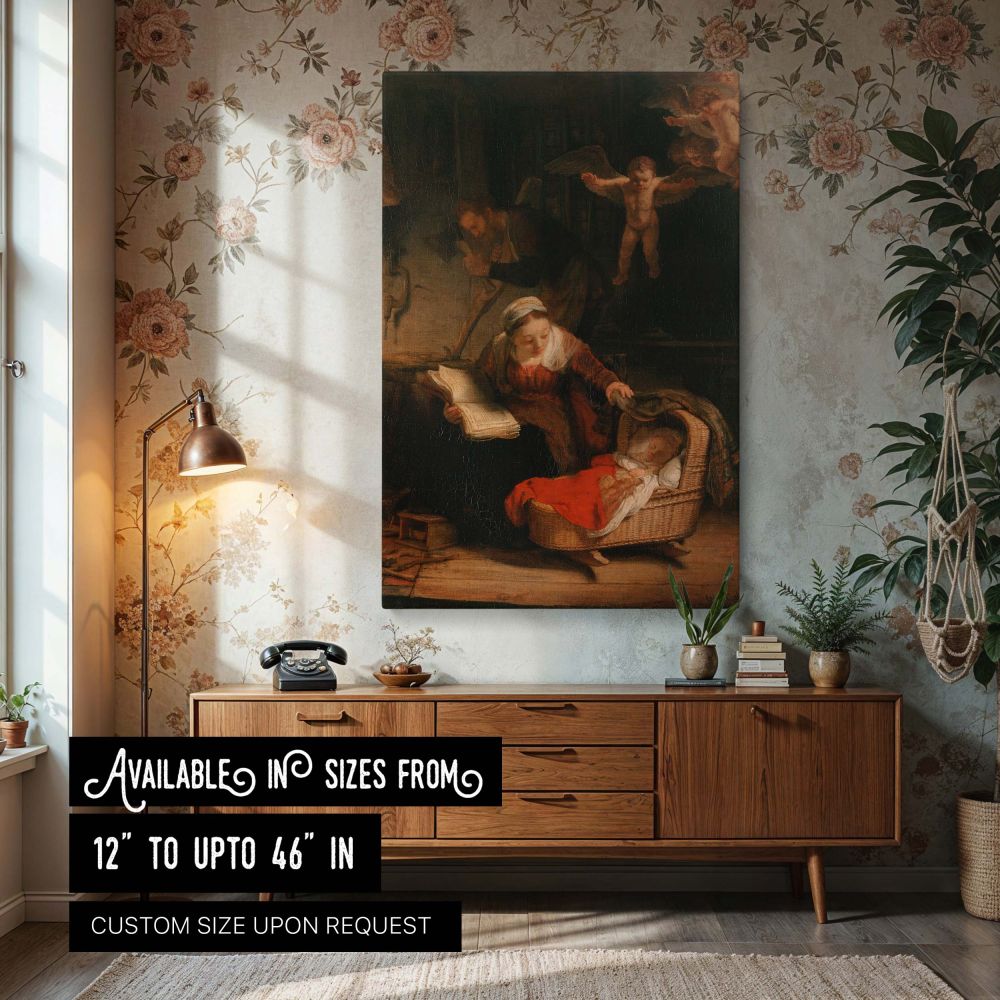 Canvas wall print of Rembrandt's The Holy Family showing the Virgin Mary leaning over the Christ child sleeping in a cradle wrapped in red, while St. Joseph works quietly in the shadows and cherubs hover above with soft wings. The entire scene glows with 