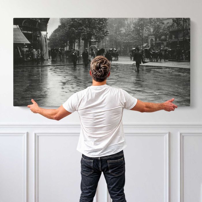 A Wet Day on the Boulevard, Paris (1894) canvas print, canvas shown with a person for scale