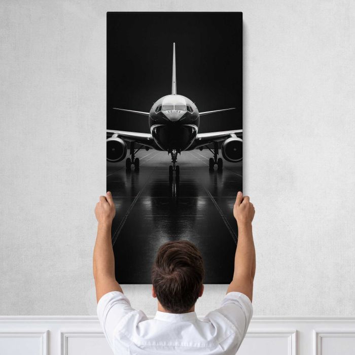 Airliner Aircraft in Monochrome canvas print, tall canvas held against a wall