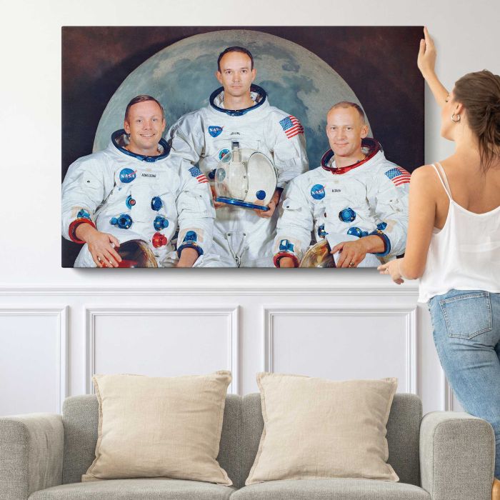 Apollo 11 Crew Portrait — Armstrong, Collins and Aldrin canvas print, canvas shown with a person for scale