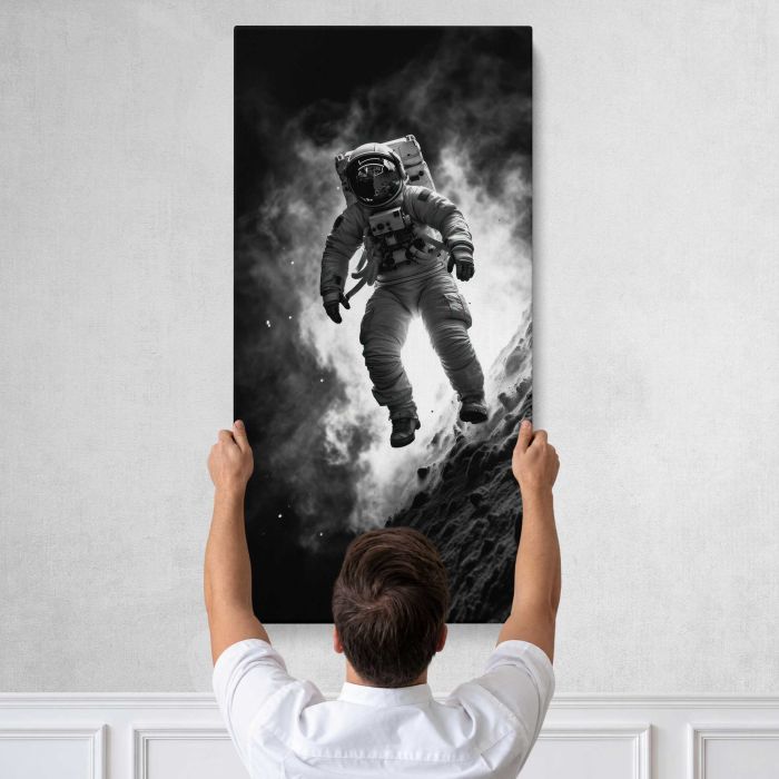 Astronaut on a Rocky Moon Landscape canvas print, tall canvas held against a wall