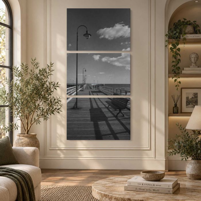 Black and white empty seaside pier with benches and lamps canvas print, interior display view