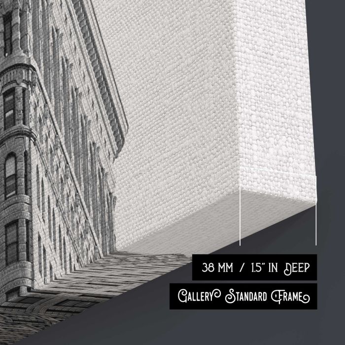 Black and white photo looking up at the Flatiron Building in New York City canvas print, canvas surface and edge detail